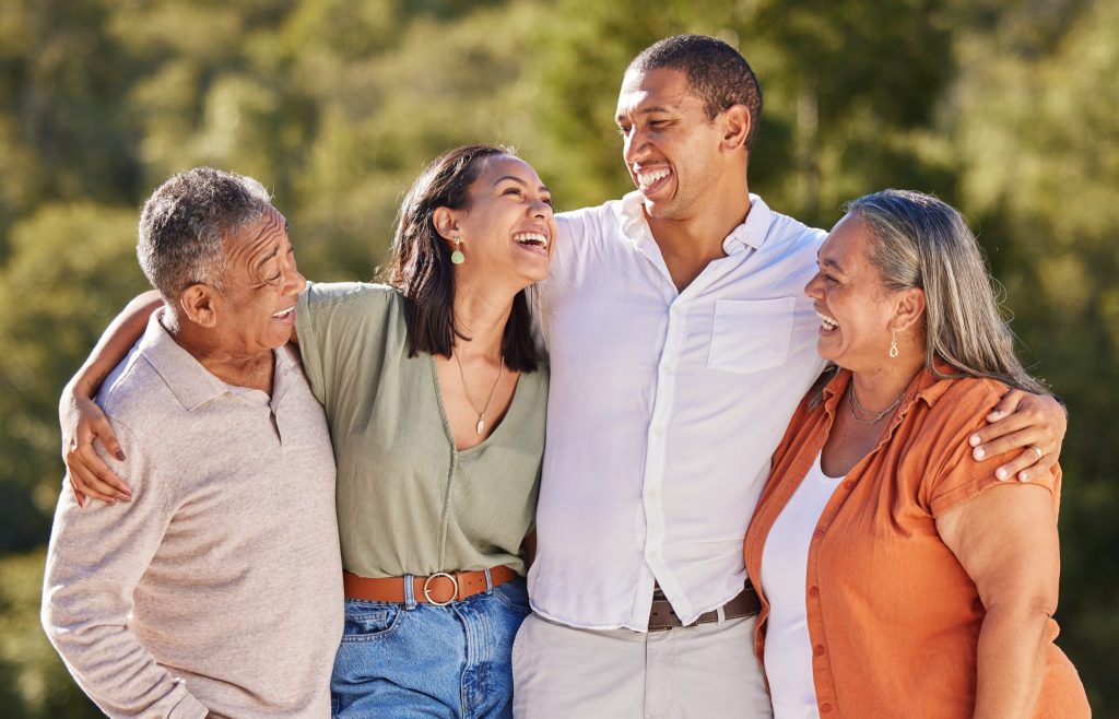 Man and woman with senior parents